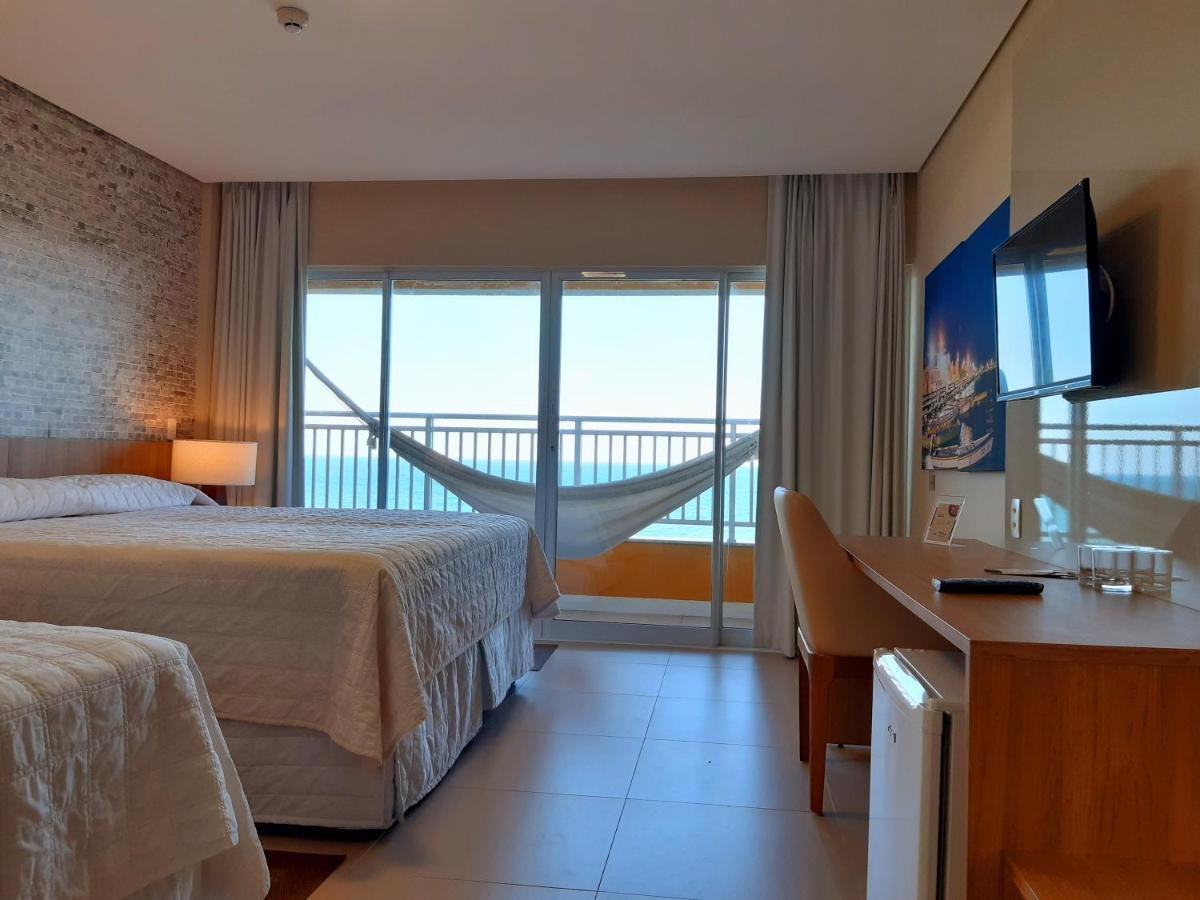 Quarto Triplo Deluxe com Vista Mar