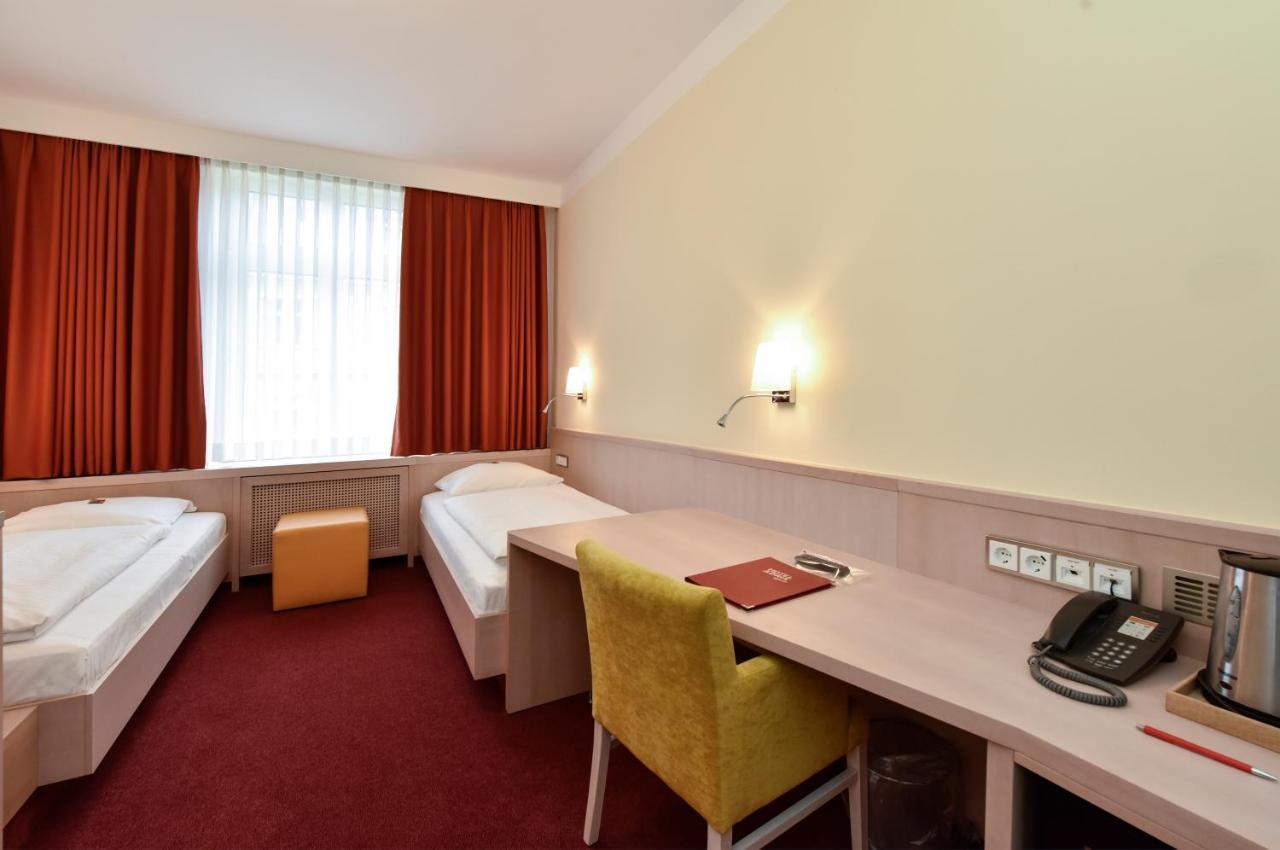 Tweepersoonskamer met 2 Aparte Bedden