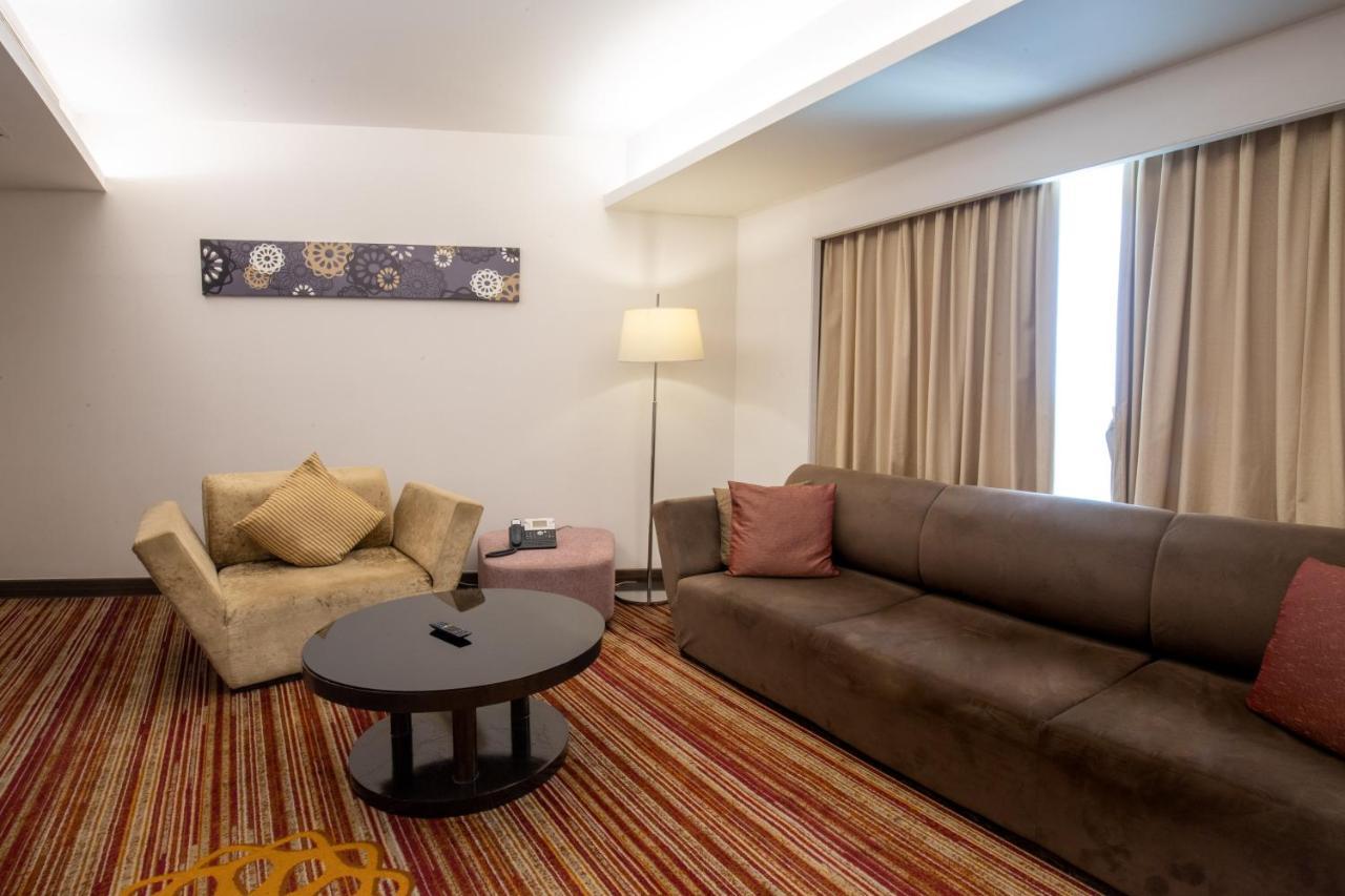 Junior King Suite with Complimentary IMFL from 6:00 pm to 8 pm at Barcode and Two Way Airport Transfer,1661122786:JPEG
