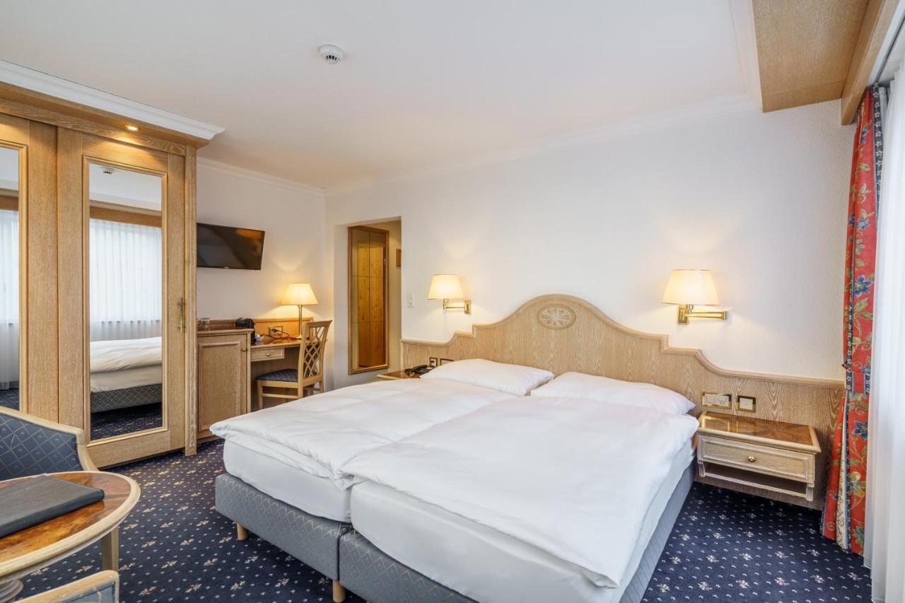 Superior Double Room with Matterhorn View and Balcony or Ground Floor Terrace