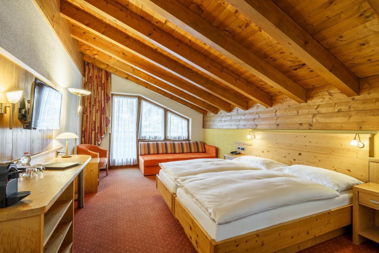 Deluxe Double Room with Matterhorn View and Balcony or Ground Floor Terrace