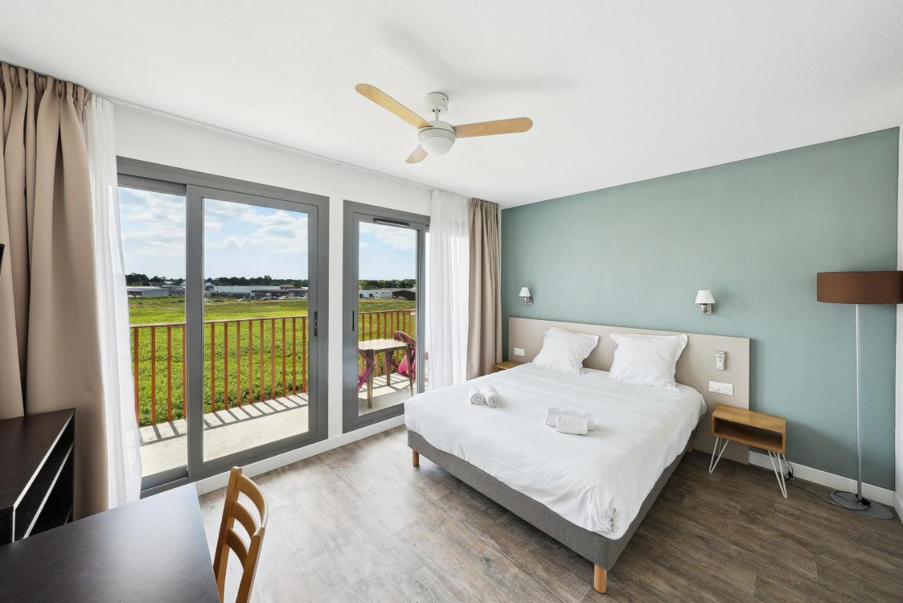 Appartement avec 1 Lit double, 2 Lits Simples et Canapé-Lit