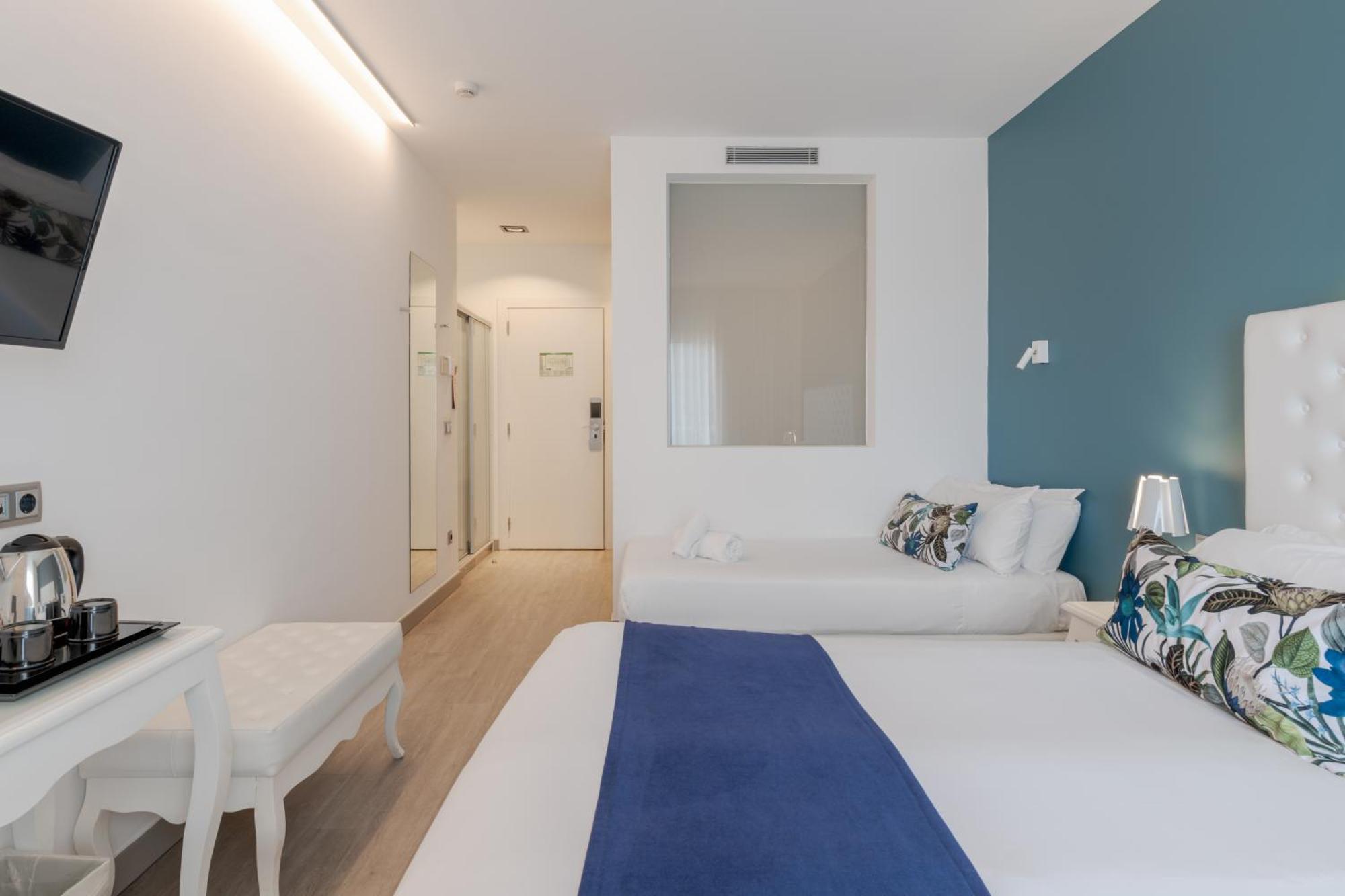 Chambre Triple Confort avec Balcon