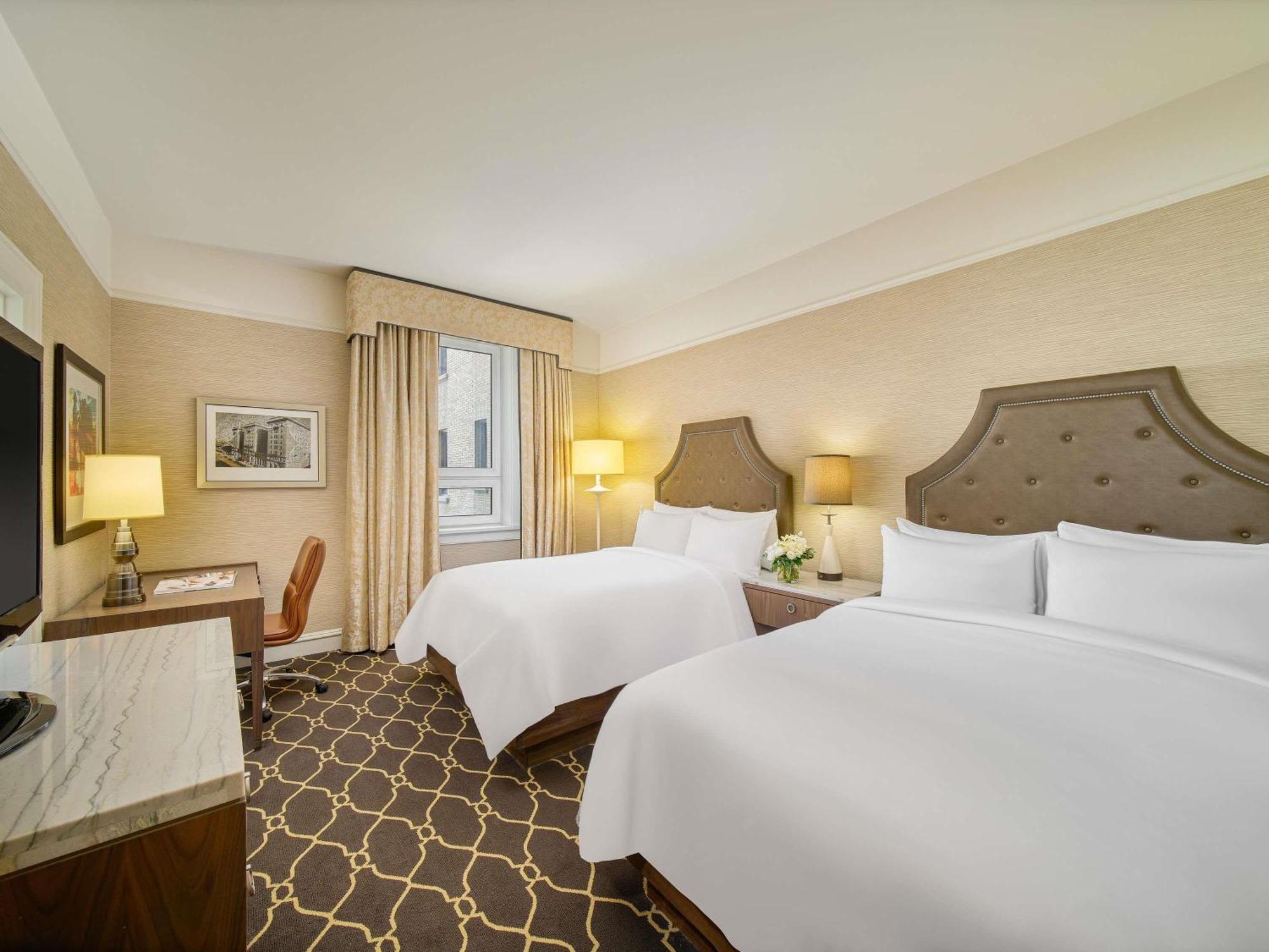 Double Room with Two Double Beds and City or Courtyard View