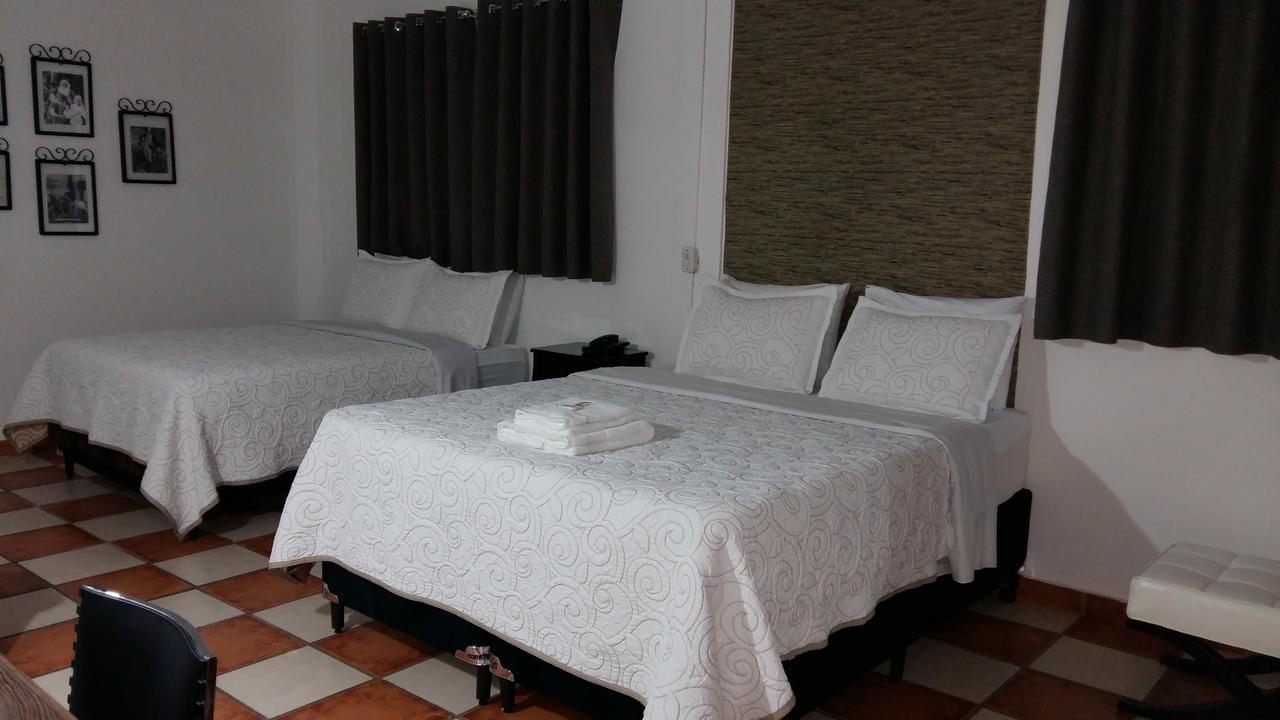 Quarto Quádruplo Deluxe com Ar-condicionado