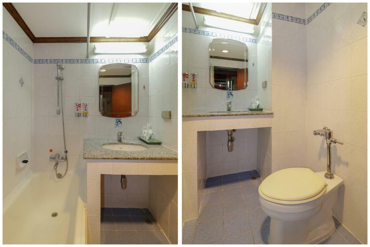 Quarto Twin com Vista Piscina