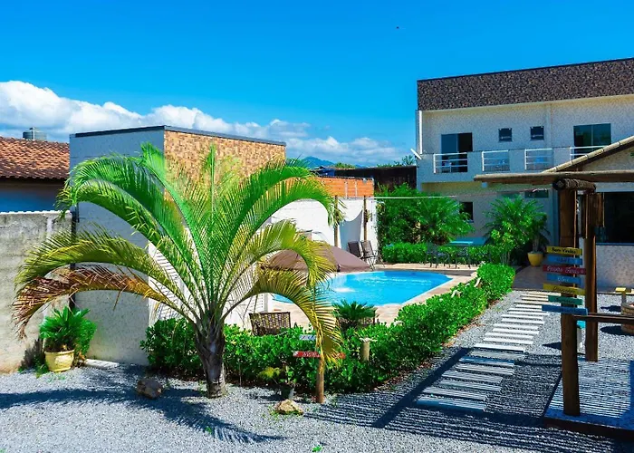 CASA PREMIUM em Peruíbe com FOGUEIRA, Brinquedoteca, Piscina, Lareira de Jardim, Churrasqueira e 4 grandes quartos para 16 pessoas!